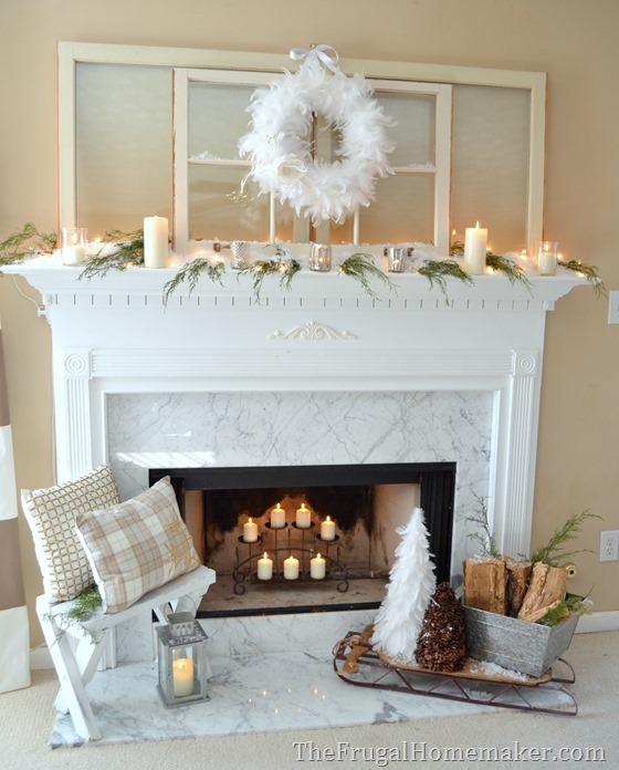 Winter white + green mantel dressed in candlelight
